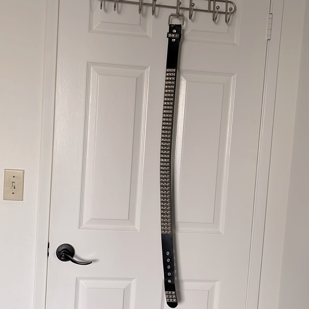 Studded, black, leather belts, practically in brand new condition